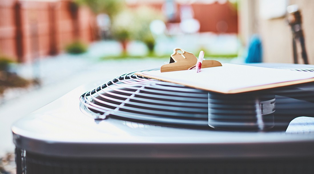 Air conditioner with clipboard and paper